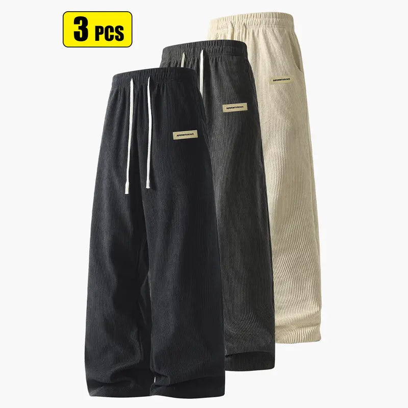Men’s corduroy casual long pants for spring and autumn, elastic drawstring waist, loose straight fit, breathable and skin-friendly, comfortable everyday men’s trousers.
