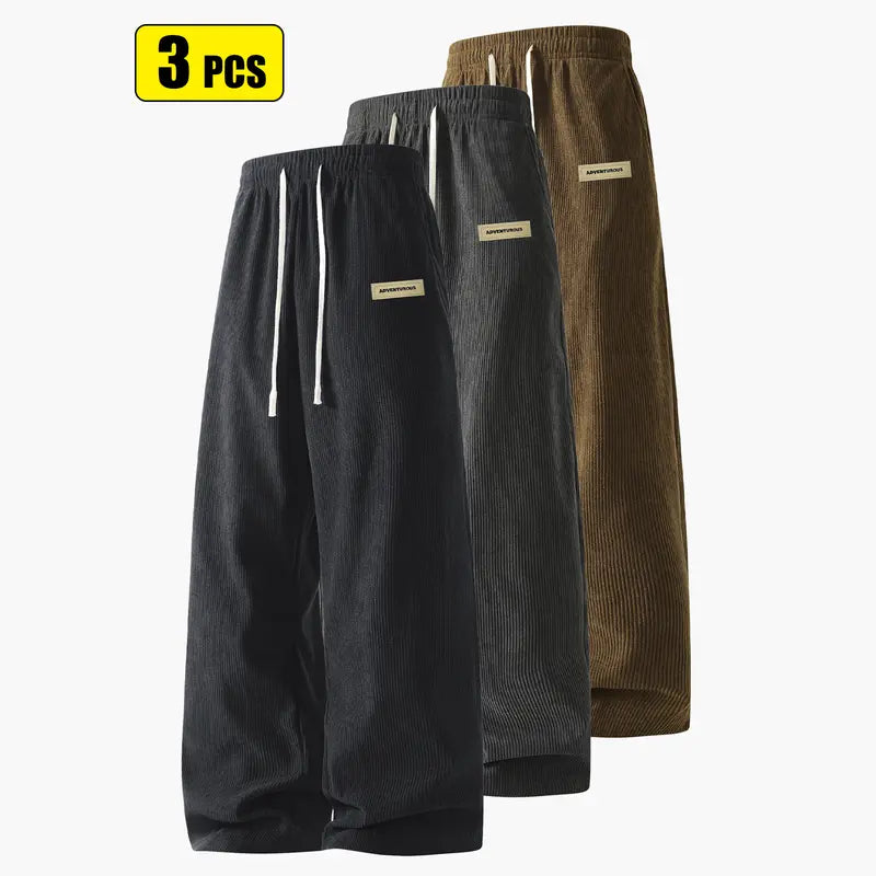 Men’s corduroy casual long pants for spring and autumn, elastic drawstring waist, loose straight fit, breathable and skin-friendly, comfortable everyday men’s trousers.