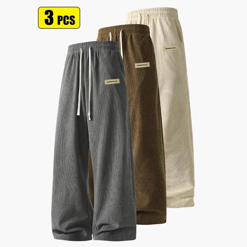Men’s corduroy casual long pants for spring and autumn, elastic drawstring waist, loose straight fit, breathable and skin-friendly, comfortable everyday men’s trousers.